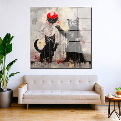 Zwei schwarze Katzen spielen mit Ball Acrylglasbild Wandbild Bild Wanddeko XL